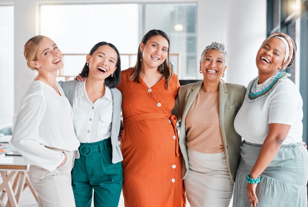 Group of women standing together, colorful